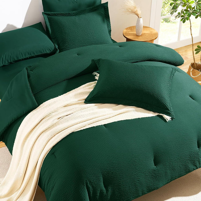 CozyLux Queen Comforter Set Emerald Green - 7 Pieces Striped Seersucker Bed in a Bag, Soft Lightweight Boho Bedding Set with All Season Comforters Queen Size, Sheets, Pillowcases & Shams