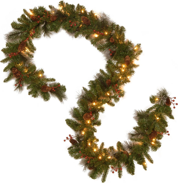 National Tree Company Pre-Lit Artificial Christmas Garland, Green, Crestwood Spruce, White Lights, Decorated with Glitter, Pinecones, Berry Clusters, Battery Operated, Christmas Collection, 9 Feet