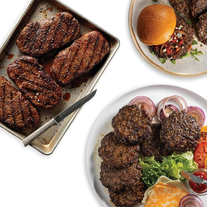 Omaha Steaks Deluxe Gift Package (4 Bacon-Wrapped Filet Mignons, 4 Steak Burgers, 4 Gourmet Jumbo Franks, 4 Au Gratin Potatoes, 4 Caramel Apple Tartlets, 1 jar Omaha Steaks Seasoning)